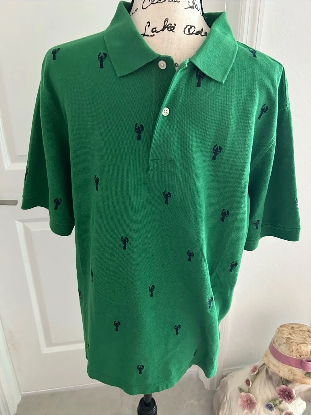 Green Polo Shirt with Navy Embroidered Lobsters. Size L